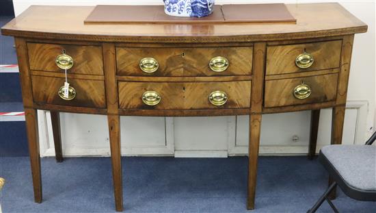 A George III mahogany bow-fronted sideboard with Greek key pattern inlay, fitted four short drawers W.166cm